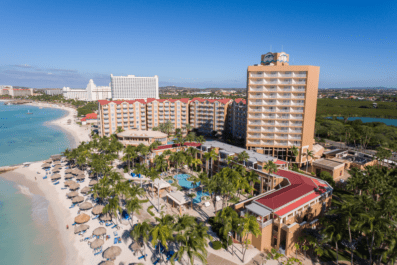 Aerial view of Divi Aruba Phoenix Resort property and Palm beach strip.